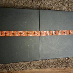 Tommy Bahama brown leather woven belt.